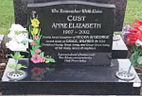 Granite headstone after lettering restoration