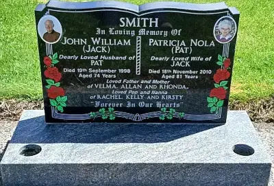 Restored granite memorial at Awanui Cemetery