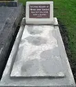 A Granite headstone single bed size grave